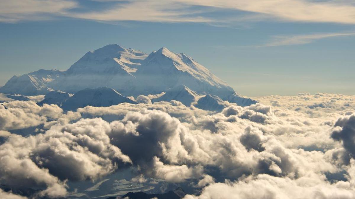 
Mount McKinley pierces through the clouds above Denali National Park and Preserve in Alaska. On Sunday, Aug. 30, 2015, the White House said that President Barack Obama will change the name of North America’s highest peak to Denali, restoring an Alaska Native name with deep cultural significance. 
