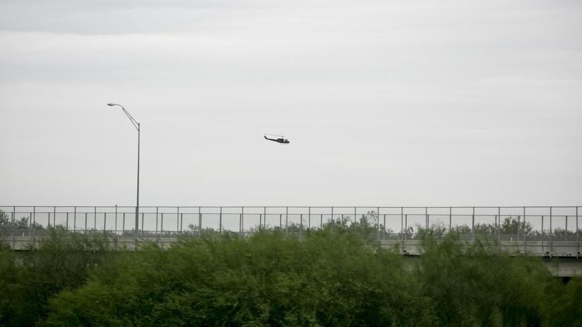 A U.S. Border Patrol helicopter flies over the Rio Grande near McAllen, Texas, Nov. 12, 2015. The numbers of migrants crossing the Rio Grande illegally have risen sharply in recent weeks, replaying scenes from the influx of Central American children and families in South Texas last year.
