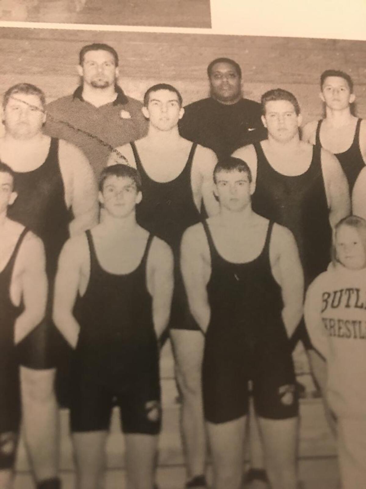 Jordan Rinaldi, left of center in the first row, and Joseph Rinaldi, standing next to him, in a photo of the Butler High School wrestling team taken when Jordan was a sophomore.