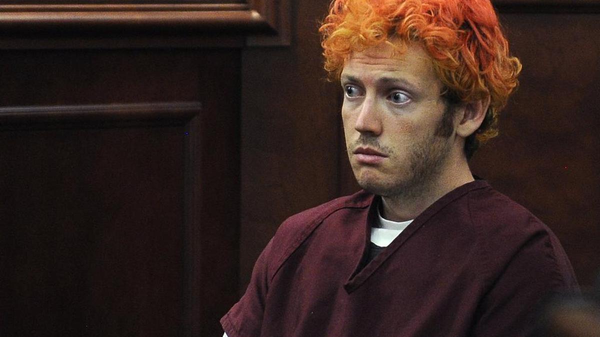 In this July 23, 2012, photo, James E. Holmes appears in Arapahoe County District Court in Centennial, Colo. Holmes was charged with 166 counts, mostly murder and attempted murder, in the July 20 assault on moviegoers at a midnight showing of “The Dark Knight Rises” in Aurora, a Denver suburb.
