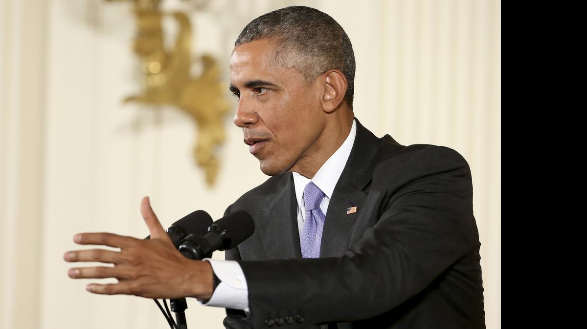 
President Barack Obama answers a question during a news conference in the East Room of the White House in Washington, Wednesday, July 15, 2015. 
