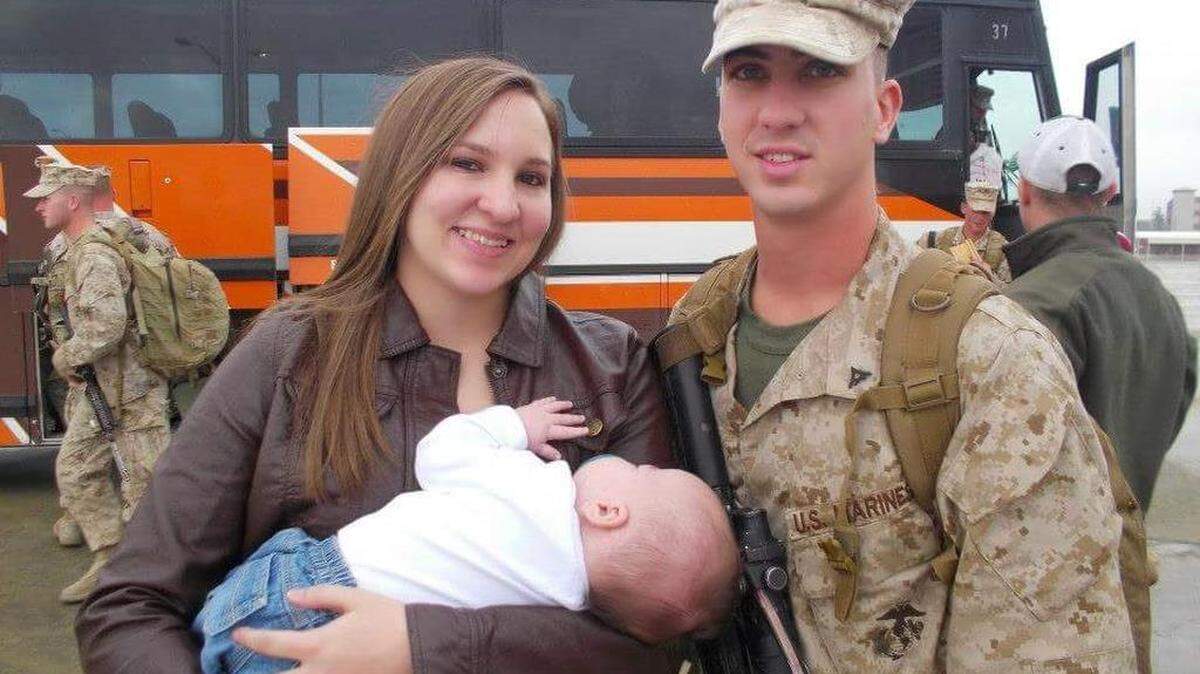 Stephen Mader, his wife, Kaycie Mader, and their son are pictured after he returned from Afghanistan. Mader says he was fired from the police force because he didn’t shoot a man who was telling him to do so.