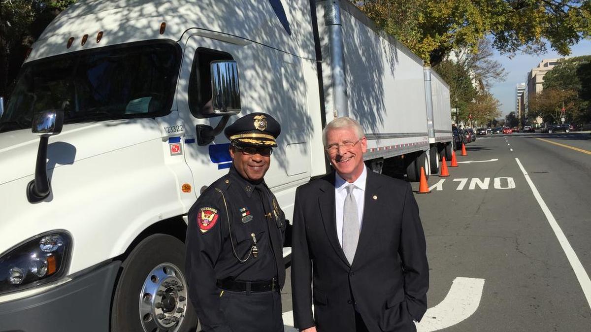 Mississippi Sen. Roger Wicker stood with Vicksburg, Miss., Police Chief Walter Armstrong beside a truck hooked to two 33-foot semitrailers outside the U.S. Capitol on Oct. 21, 2015. Wicker and a bipartisan coalition are aiming to block legislation that would extend to a maximum of 91 feet the length of trucks on all the nation’s roads.