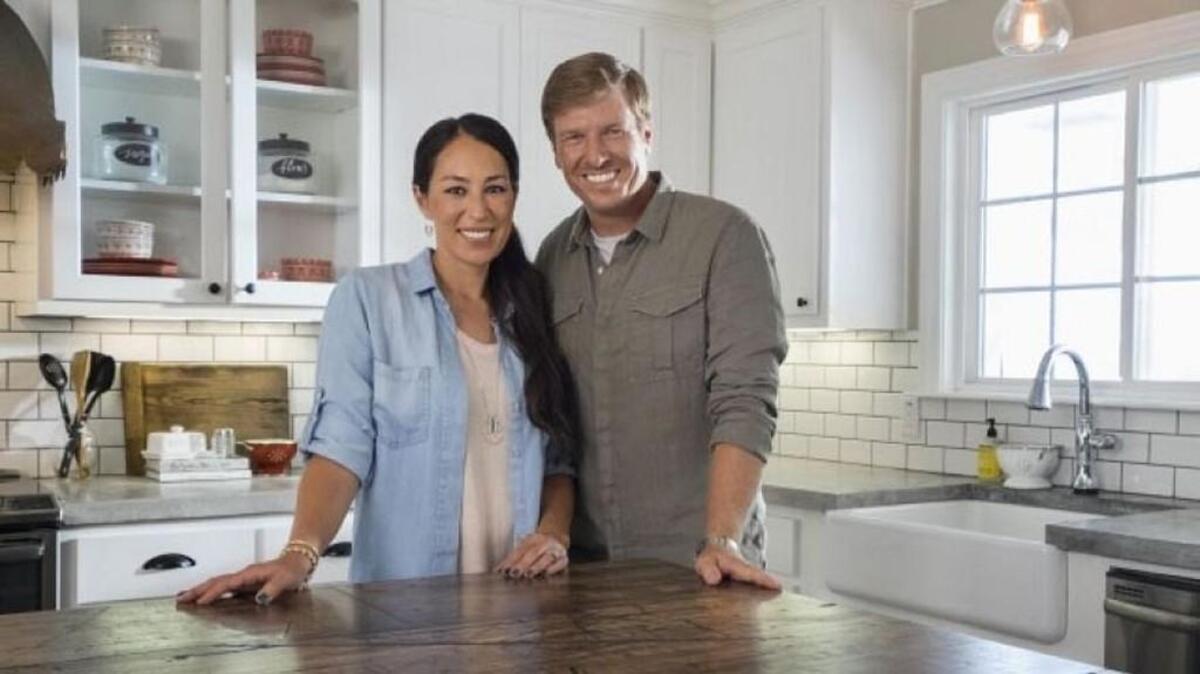 Two former business partners of Chip Gaines, right, are suing him for buying them out of their real estate company without telling them HGTV planned to broadcast “Fixer Upper” nationally. Gaines hosts the popular show with his wife, Joanna.