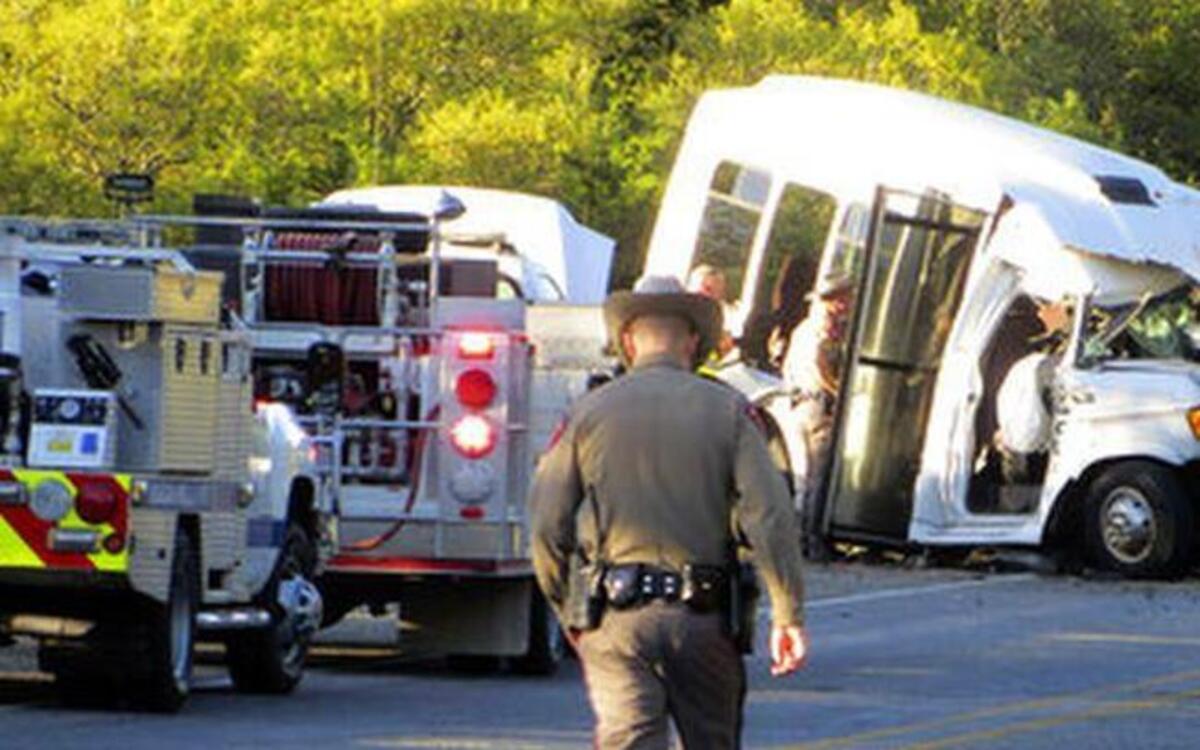 Authorities investigate after a deadly crash involving a van carrying church members and a pickup truck on U.S. 83 outside Garner State Park in northern Uvalde County, Texas.