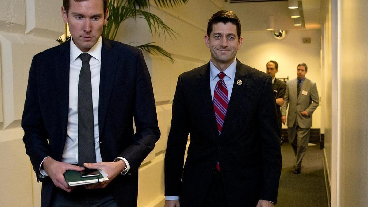 Rep. Paul Ryan, R-Wis., right, walks from a meeting on Capitol Hill in Washington, Monday, Oct. 26, 2015.