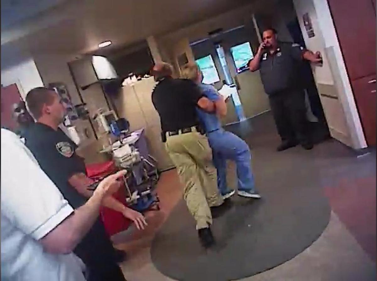 The video shows Salt Lake City Detective Jeff Payne taking nurse Alex Wubbels out of the hospital.