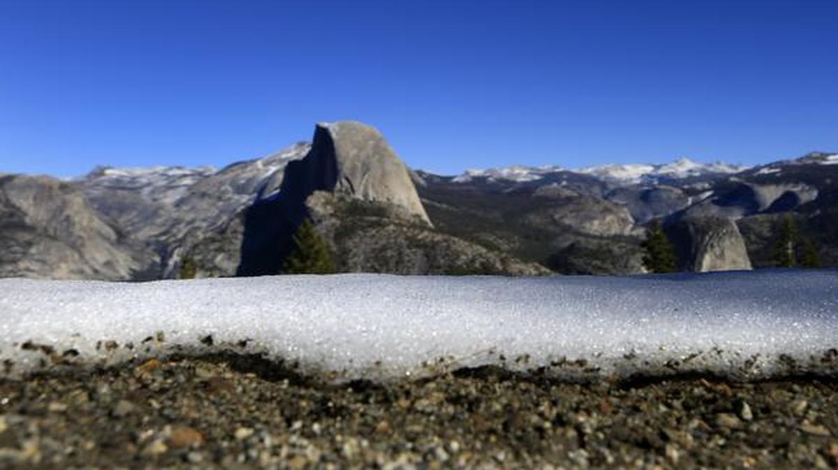 
An inch of patchy snow is all that remains on the ground at Glacier Point as trials in the area are mostly snow-free Jan. 23, 2015, in Yosemite National Park. California Gov. Jerry Brown announced strict new curbs on state water use Wednesday, April 1, 2015, to combat a worsening drought affecting more than 50 million people in the western United States.
