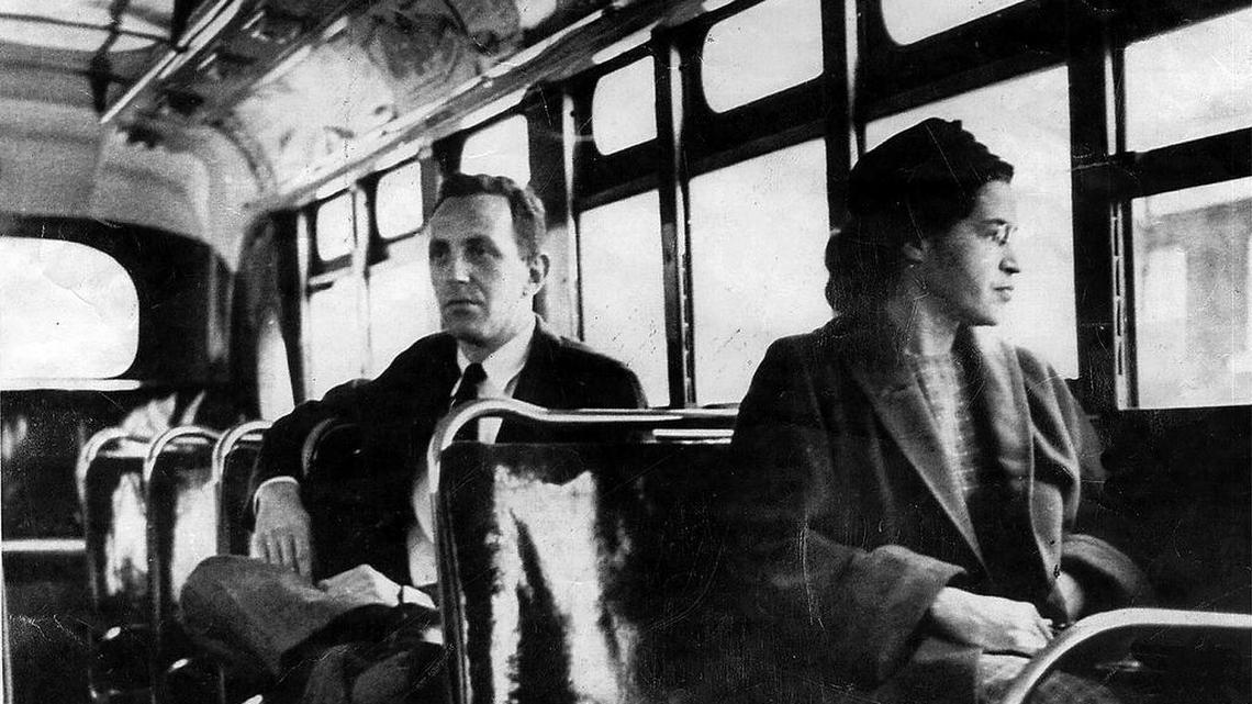 This undated file photo shows Rosa Parks riding on the Montgomery Area Transit System bus in Montgomery, Ala. Parks refused to give up her seat on a Montgomery bus Dec. 1, 1955, and ignited the boycott that led to a federal court ruling against segregation in public transportation. The 60th anniversary of a bus boycott is widely credited with helping spark the modern civil rights movement.