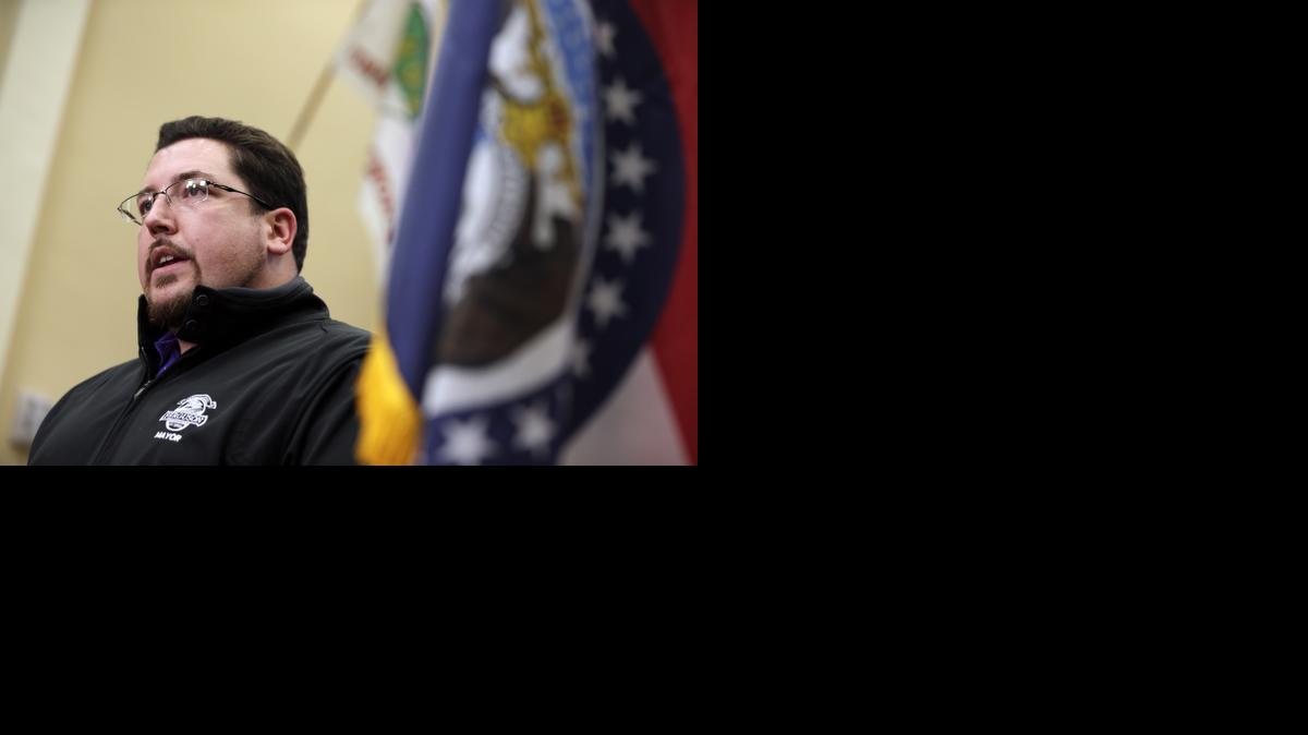 
Ferguson Mayor James Knowles III announces the resignation of police chief Thomas Jackson during a news conference in Ferguson, Mo. Despite calls for him to go, Knowles is the last man standing in Ferguson city government after a Justice Department report highly critical of the city’s police force and court system prompted six officials to resign. 
