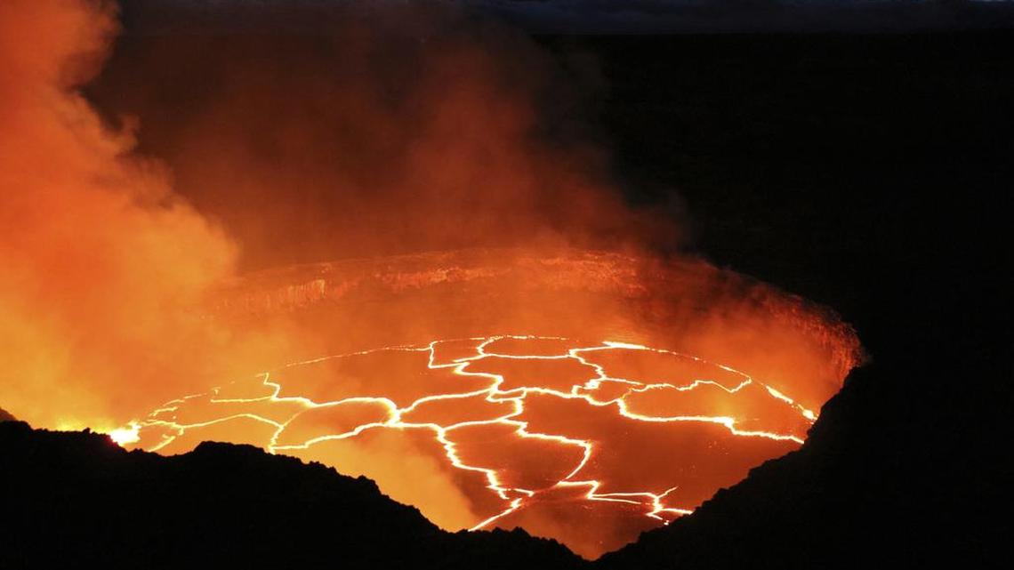 The lava lake atop Kilauea volcano erupts on Hawaii’s Big Island on Sept. 28, 2016. Federal officials have released new high definition video of the lava lake atop the active volcano, providing a rare close-up glimpse of the powerful summit eruption.