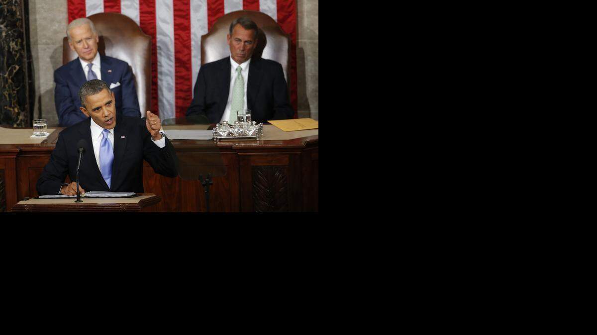 
 Vice President Joe Biden and House Speaker John Boehner of Ohio listens as President Barack Obama gives his State of the Union address on Capitol Hill in Washington on Jan. 28, 2014. 
