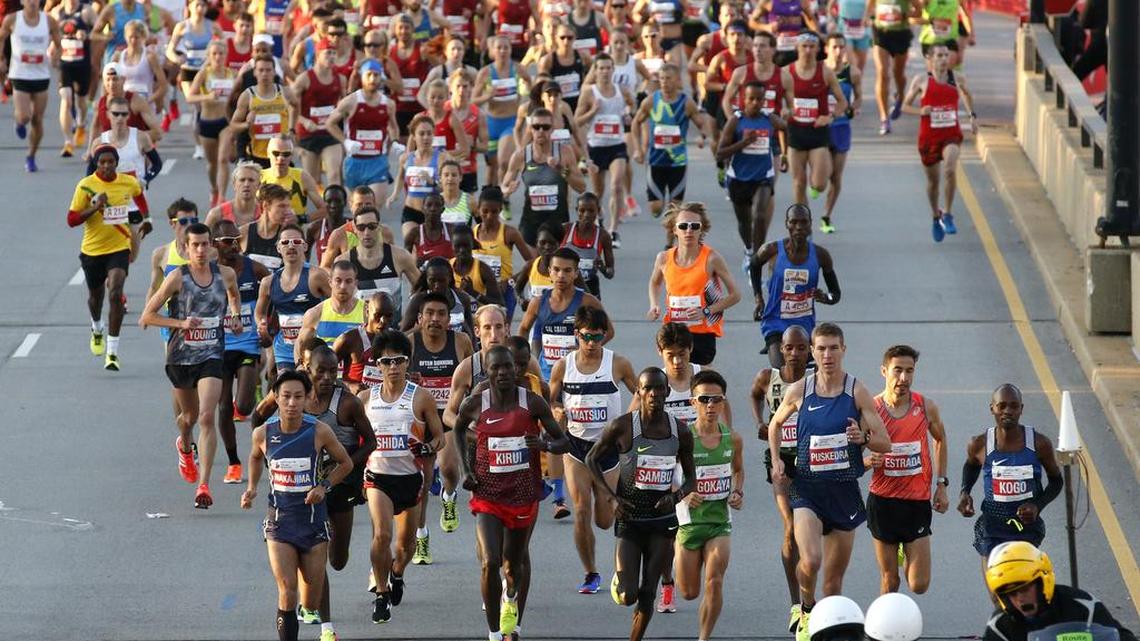 Runners participate in the Chicago Marathon, Sunday, Oct. 9, 2016.