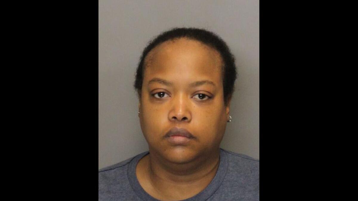 Prosecutors say Erica White poisoned her 2-year-old son to death and tried to take out credit cards in his name.