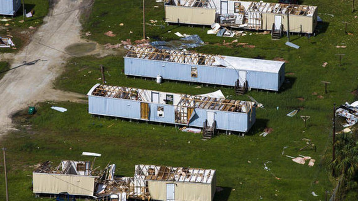 This aerial photo shows damaged homes in Immokalee, Fla., on Saturday, Sept. 16, 2017, six days after Hurricane Irma.