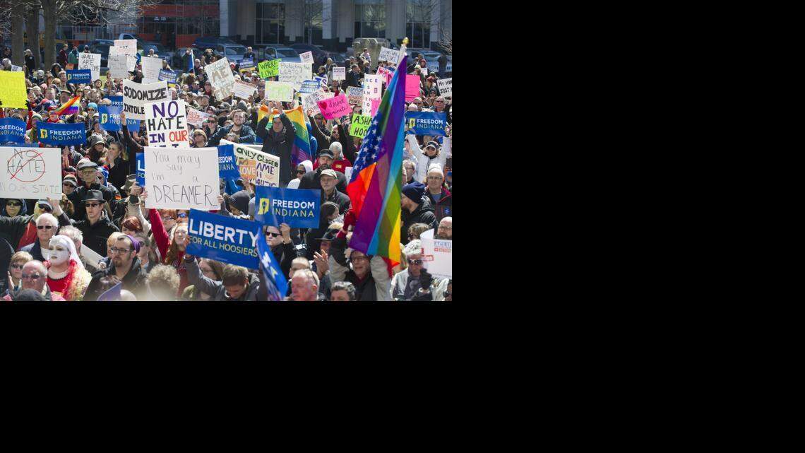 
Thousands of opponents of Indiana Senate Bill 101, known as the Religious Freedom Restoration Act, gather on the lawn of the Indiana State House on March 28, 2015, to rally against that legislation. 
