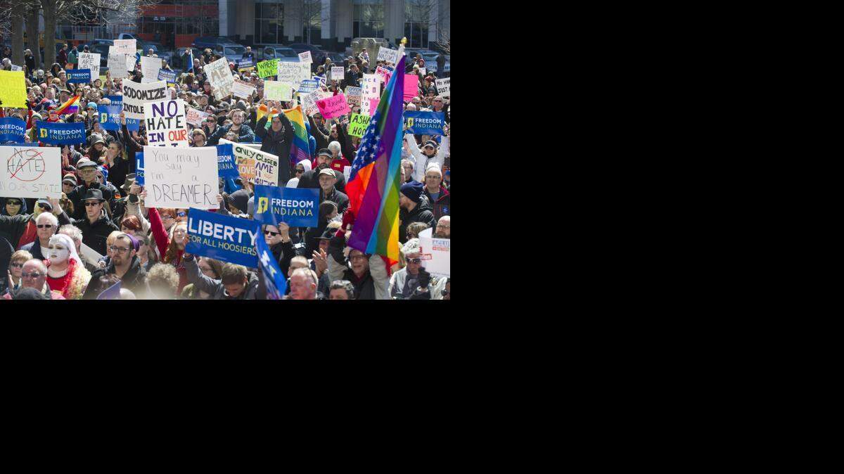 
Thousands of opponents of Indiana Senate Bill 101, known as the Religious Freedom Restoration Act, gather on the lawn of the Indiana State House on March 28, 2015, to rally against that legislation. 
