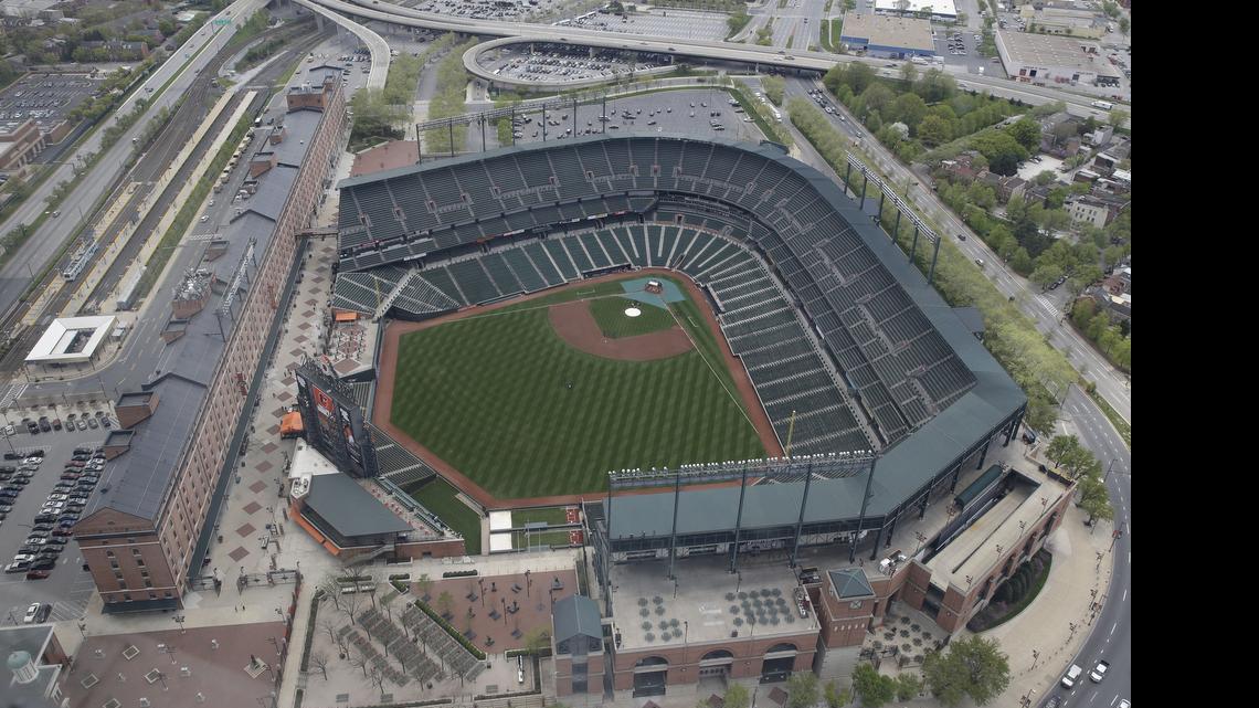 
Oriole Park at Camden Yards sits empty, Tuesday, April 28, 2015, in Baltimore, as unrest continued into a second day. The Baltimore Orioles postponed Tuesday’s baseball game against the Chicago White Sox, and Wednesday’s game will be closed to the public. 
