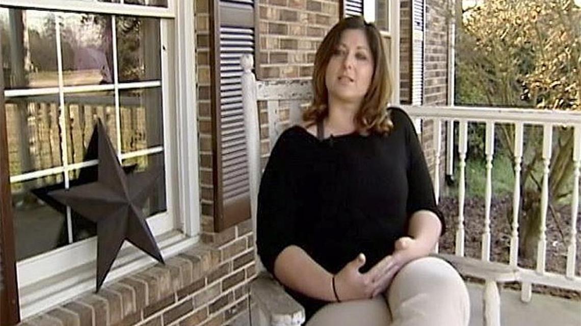 In this undated image made from video and provided by WYFF News-4, Teacher Leigh Anne Arthur speaks to a reporter in Union County, S.C. Some South Carolina high school students are calling for the return of Arthur who resigned after a student spread a nude picture of her through text messages and social media.