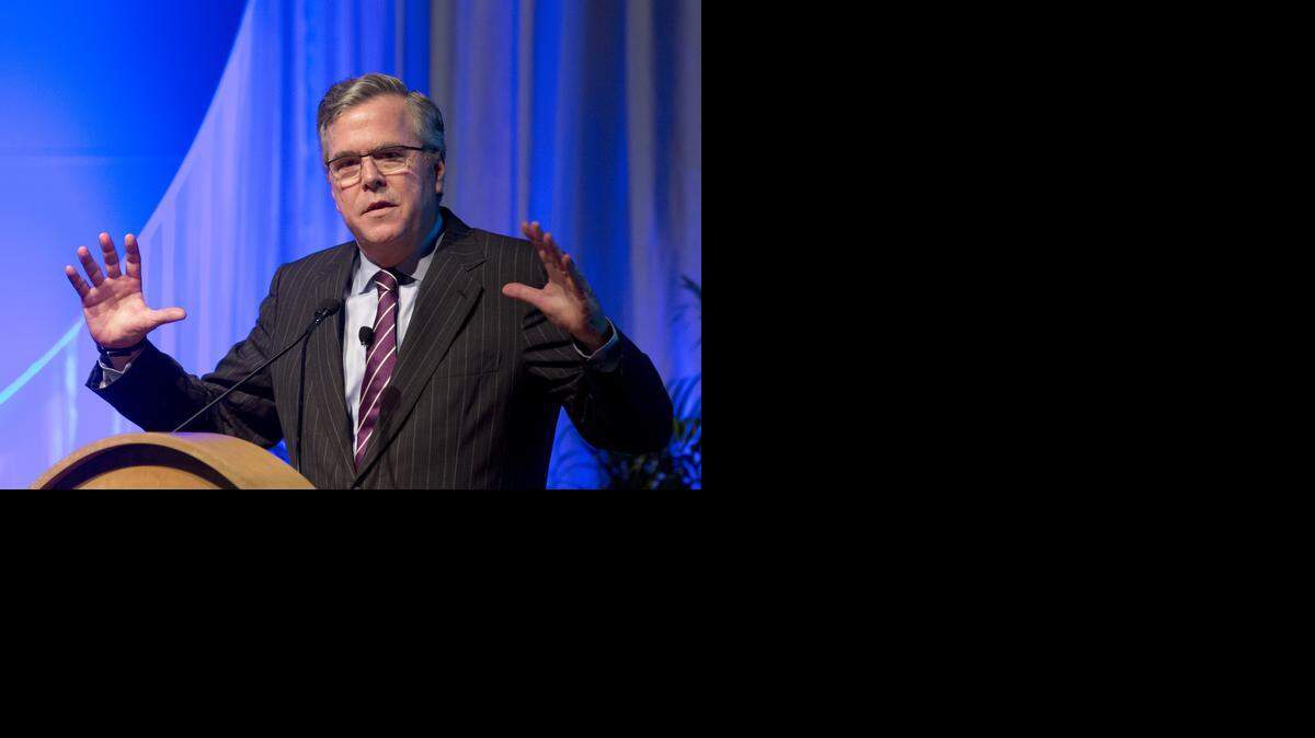 
Former Florida Gov. Jeb Bush gestures as he speaks at the Inside ITFs Conference at the Westin Diplomat Resort & Spa in Hollywood, Fla., on Jan. 29, 2014.
