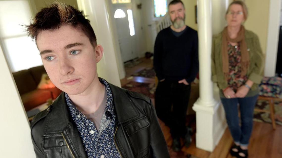 Alexander Gallagher, 15, a transgender youth, is pictured with his mom, Karry and dad, Jamey, in their home on March 22, 2016, in Baltimore.