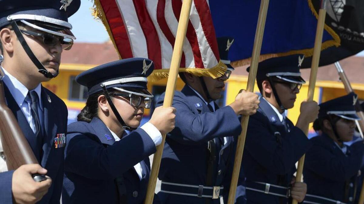 Color Guard members of the Rivera High School Air Force JROTC carry the U.S. Colors and other military-related flags during a Veterans Day parade Nov. 4, 2017, along Southmost Boulevard in Brownsville, Texas.