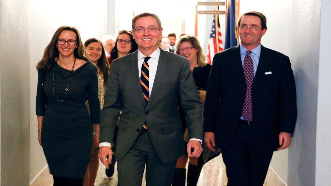 Lexington Mayor Jim Gray, center, filed papers to run for the U.S. Senate in the secretary of state office at the State Capitol in Frankfort, Ky., on Tuesday, Jan. 26, 2016. Gray, a Democrat, is challenging Republican U.S. Sen. Rand Paul.