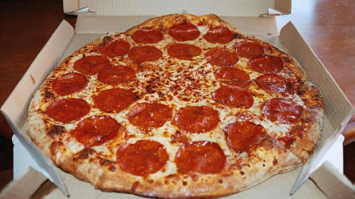 A police officer in Las Cruces, N.M. was cited for indecent exposure last month after allegedly answering the door naked for a Domino’s delivery.