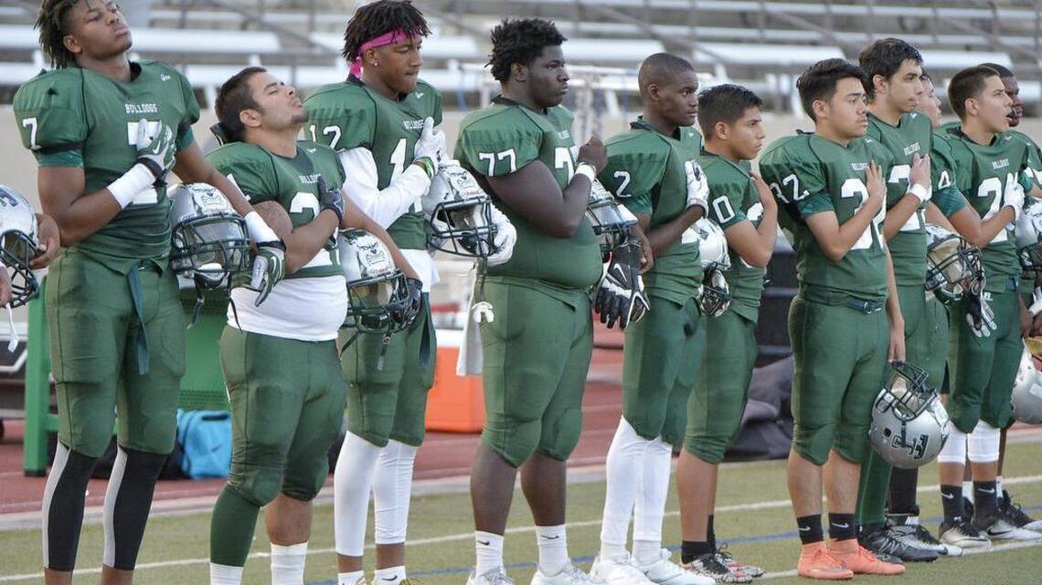 Why one city’s mostly black high school football teams aren’t joining anthem protest