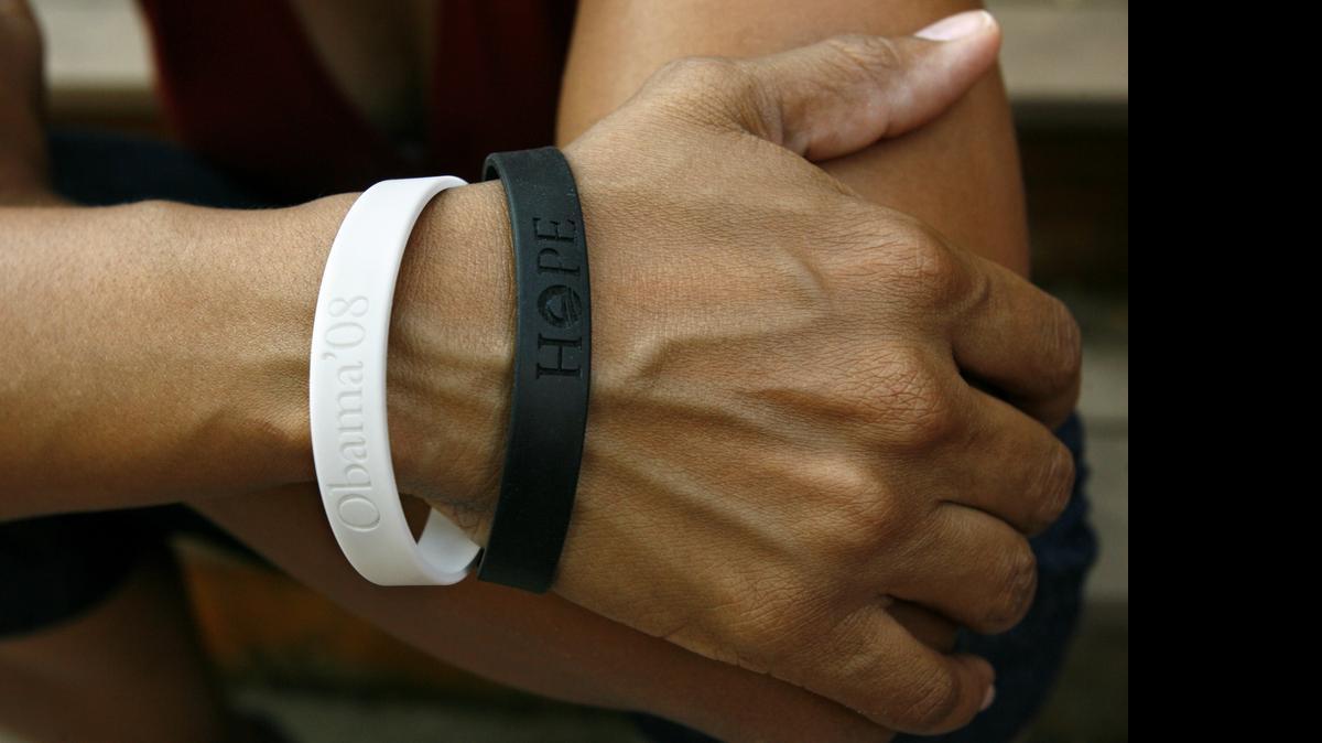 
A person wears bracelets supporting Sen. Barack Obama's candidacy for president on June 11, 2008. Non-Hispanic whites with American Indian ancestry make up a full half of the current population of mixed-race Americans but are among the least likely to say that they are multiracial, according to a study released Thursday.
