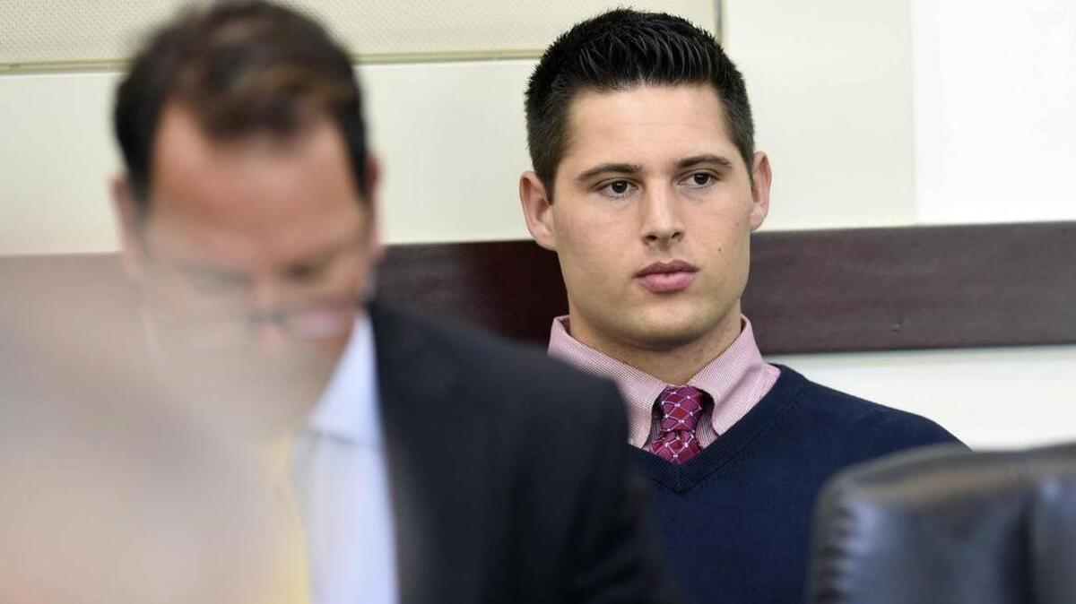 Brandon Vandenburg, right, a former Vanderbilt football player, waits in court for proceedings to begin in his rape trial Tuesday, June 14, 2016, in Nashville, Tenn.