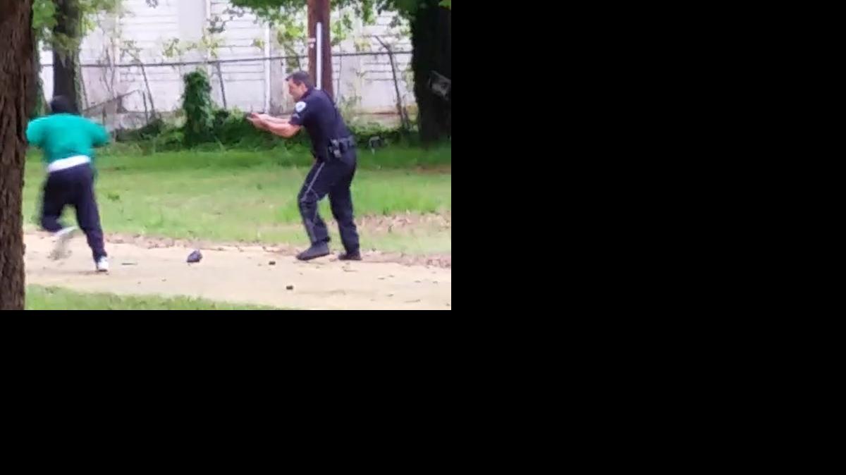 
In this April 4, 2015, frame from video provided by Attorney L. Chris Stewart representing the family of Walter Lamer Scott, Scott appears to be running away from City Patrolman Michael Thomas Slager, right, in North Charleston, S.C. Slager was charged with murder on Tuesday, April 7, hours after law enforcement officials viewed the dramatic video that appears to show him shooting a fleeing Scott several times in the back. 
