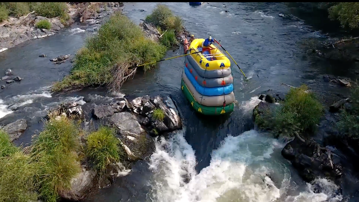 Covey Baack tackled class four rapids in Gold Hill, Oregon with six boats stacked on each other.