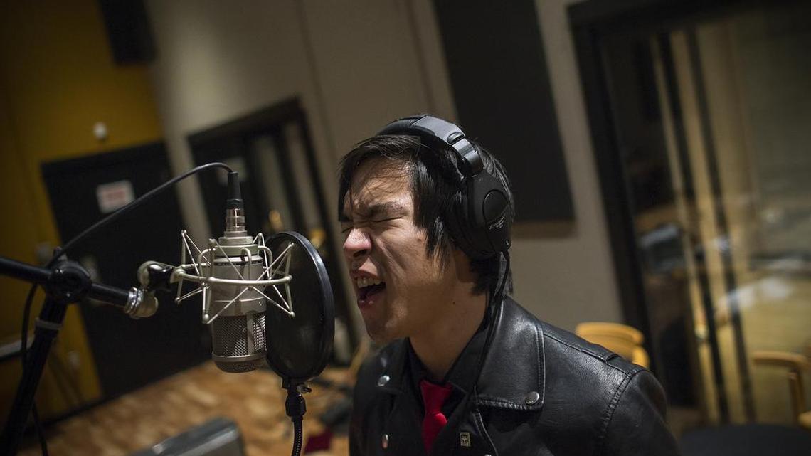 Ken Shima of the band The Slants warms up during a recording session in Eugene, Ore., in December 2016. The band is challenging the Patent Office's decision to reject a trademark for their name, arguing that the government cannot make the decision on what kind of speech is disparaging.