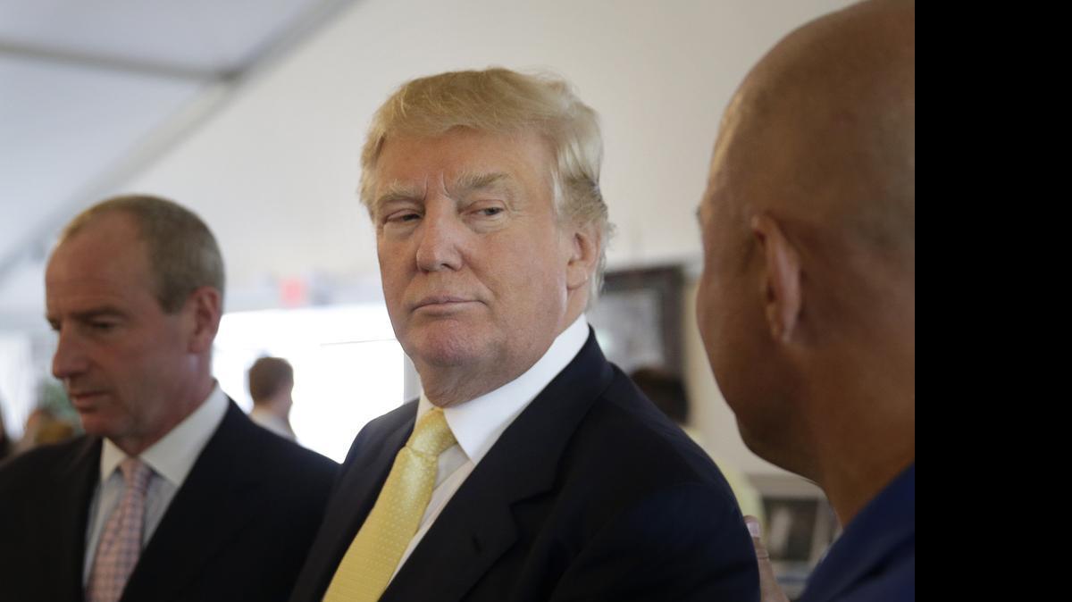 
Republican presidential candidate Donald Trump arrives at a fundraising event at a golf course in the Bronx borough of New York on Monday.
