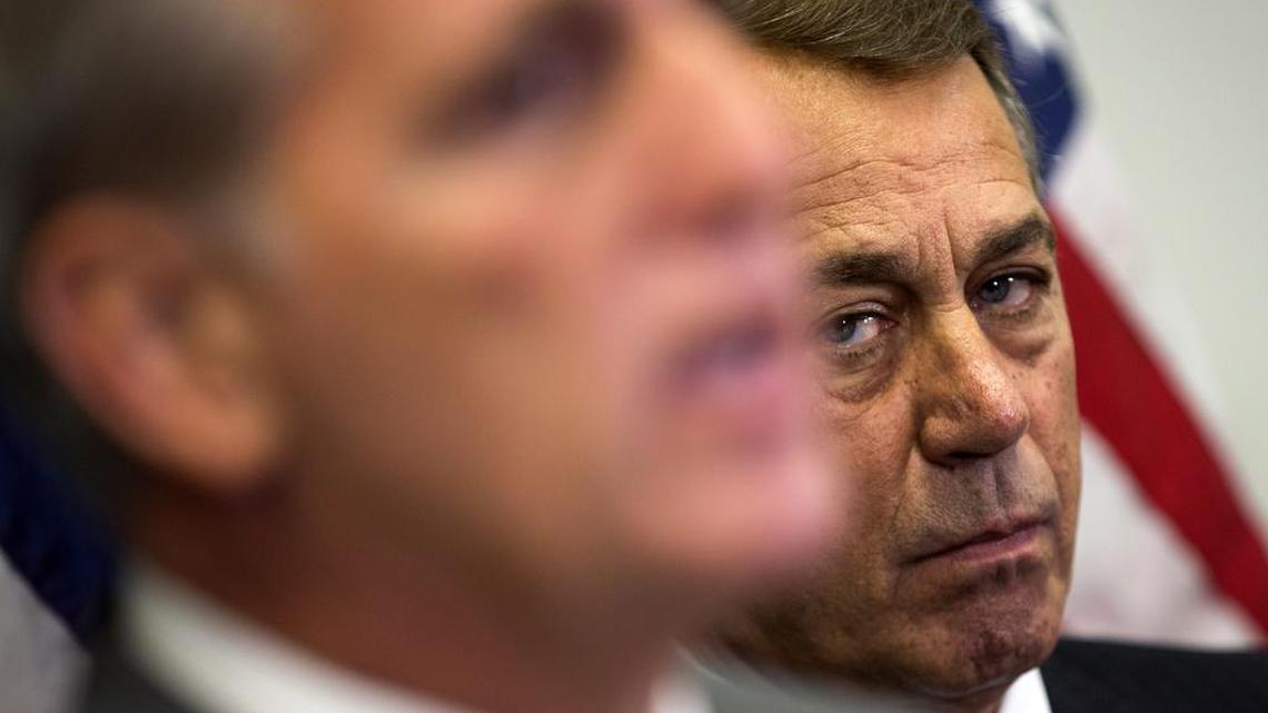 
In this Oct. 7, 2015, photo, outgoing House Speaker John Boehner of Ohio listens at right as House Majority Leader Kevin McCarthy of Calif., speaks during a new conference on Capitol Hill in Washington.The Ohio House Republican is staying put, for now – and that could improve the chances for a debt limit increase by early next month to avoid a market-shattering government default and possibly a bipartisan budget deal to head off a government shutdown in December. Conservative hard-liners have already forced Boehner to announce he’s leaving and then caused further chaos by blocking the ascension of McCarthy.
