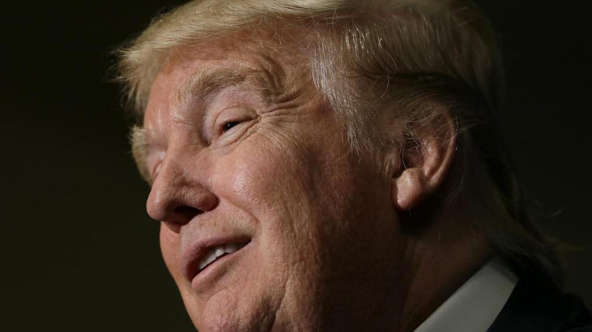 
Republican presidential candidate Donald Trump speaks during a news conference Tuesday in Dubuque, Iowa. The GOP front-runner says he will never eat Oreos again because its parent company moved a factory from Chicago to Mexico.
