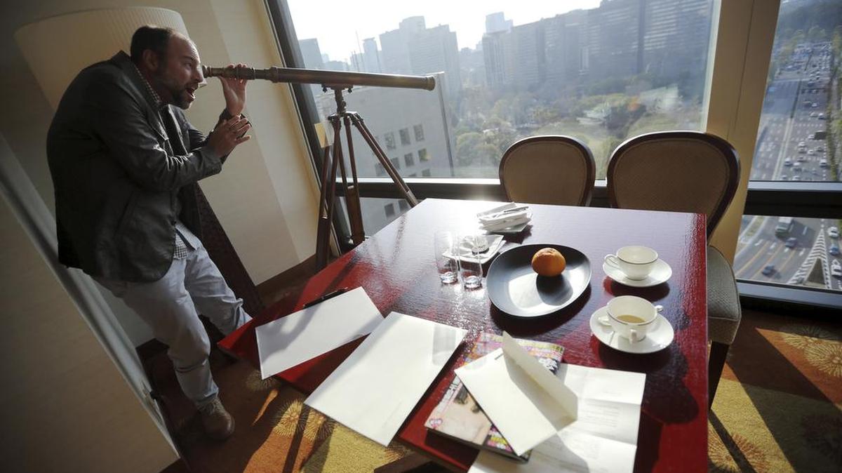 
Noel Biderman, chief executive of Avid Life Media Inc., looks out a window on April 1, 2014. Avid Life Media operates AshleyMadison.com. Biderman built his livelihood around the unconventional philosophy that cheating is a natural part of married life. Yet he himself is said to be a devoted husband. And his wife of 12 years says she would be devastated if he was unfaithful. 

