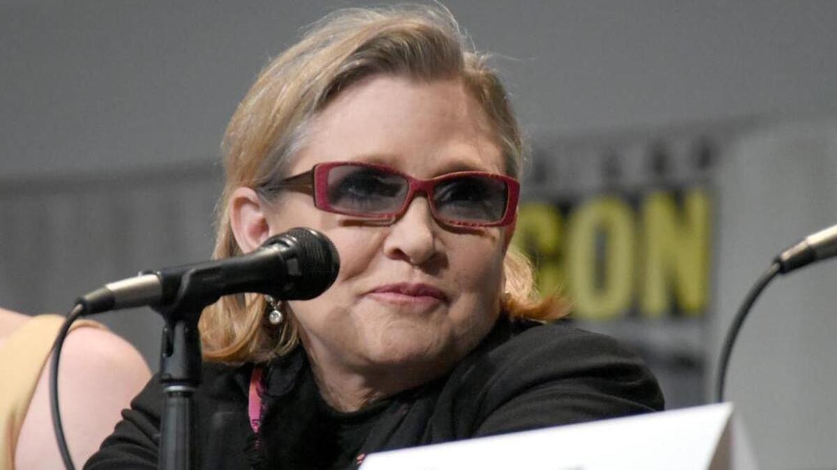 Carrie Fisher appears at Lucasfilm's "Star Wars: The Force Awakens" panel on day 2 of Comic-Con International on Friday, July 10, 2015, in San Diego, Calif.