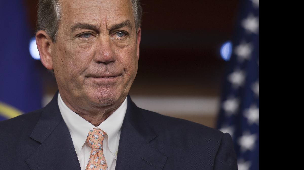 
House Speaker John Boehner, R-Ohio, speaks with reporters on July 9, 2015, on Capitol Hill in Washington. The dispute in Congress over the Confederate flag threatened on Friday to upend House Republican plans to move forward on routine spending legislation, amid concerns that Democrats could hijack the bills to debate the flag. House Republican aides said that a bill covering general government operations tentatively set for consideration next week would not be considered after all. 
