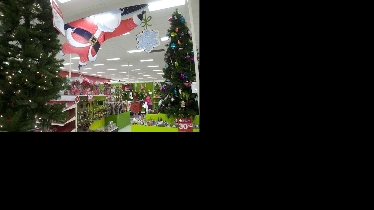 
Last-minute shoppers look for their Christmas presents at Target in Porterville, Calif., on Christmas Eve. Come Friday the giftees may be returning them.
