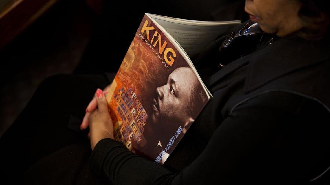 Doris Gray sits with a program during the Rev. Martin Luther King Jr. holiday commemorative service at Ebenezer Baptist Church, where King preached, Monday, Jan. 18, 2016, in Atlanta.