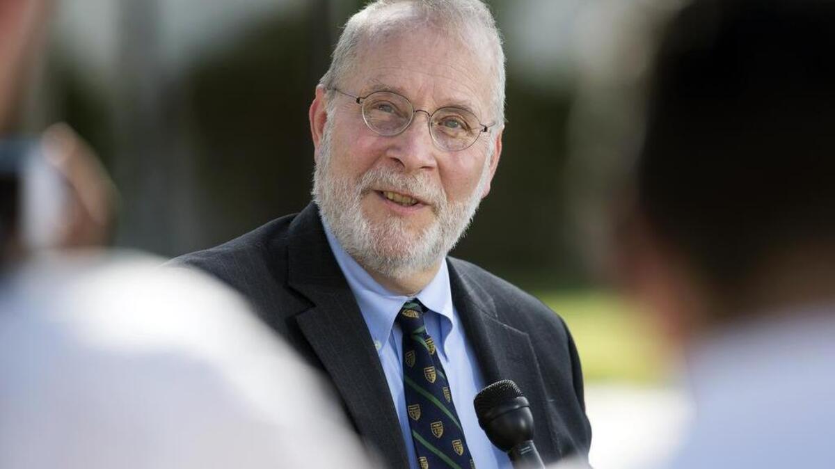 
Defense lead counsel Eugene Fidell speaks to members of the media Friday after a preliminary hearing to determine if Army Sgt. Bowe Bergdahl will be court-martialed at Fort Sam Houston, Texas. Bergdahl, who left his post in Afghanistan and was held by the Taliban for five years, is charged with desertion and misbehavior before the enemy.
