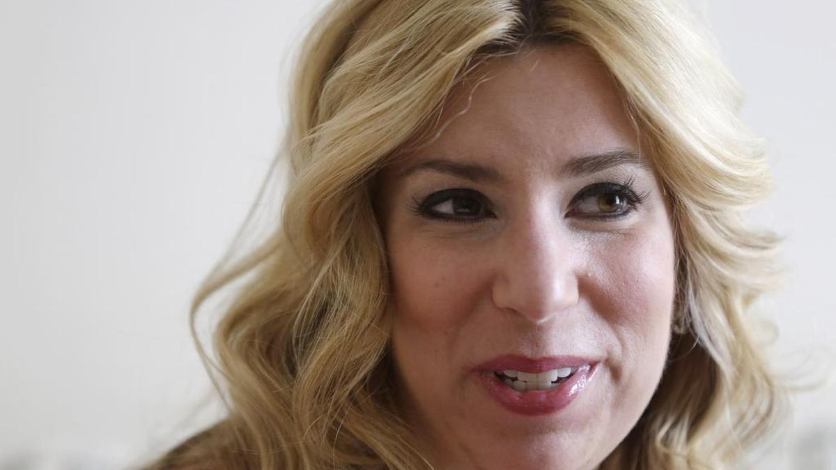 
 Boston Marathon bombing survivor Heather Abbott speaks with a reporter at her home in Newport, R.I., in March 2014. The foundation that Abbott created will donate its first custom-made artificial limb to Hillary Cohen of Walpole, Mass., who will have it fitted on Monday, Oct. 19, 2015. Cohen’s right leg was amputated below the knee in 2014 because of complications from neurofibromatosis. Abbott had her own left leg amputated below the knee after sustaining severe injuries near the marathon finish line in the 2013 terrorist attack. 
