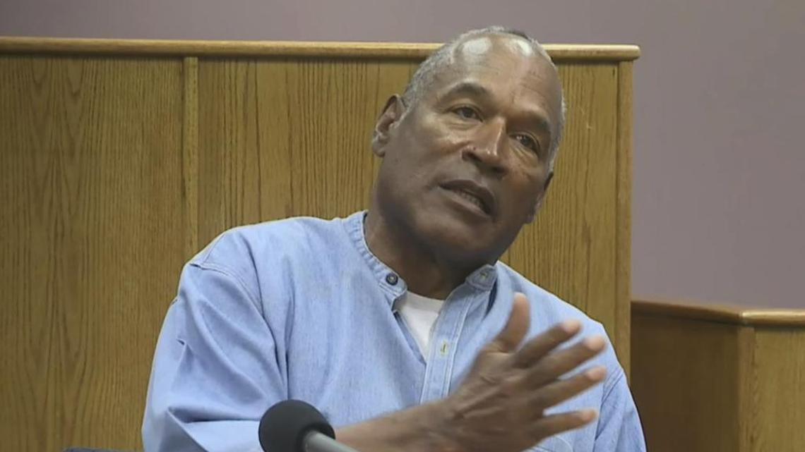Former NFL football star O.J. Simpson appears via video for his parole hearing at the Lovelock Correctional Center in Lovelock, Nev., on Thursday, July 20, 2017. Simpson was convicted in 2008 of enlisting some men he barely knew, including two who had guns, to retrieve from two sports collectibles sellers some items that Simpson said were stolen from him a decade earlier.