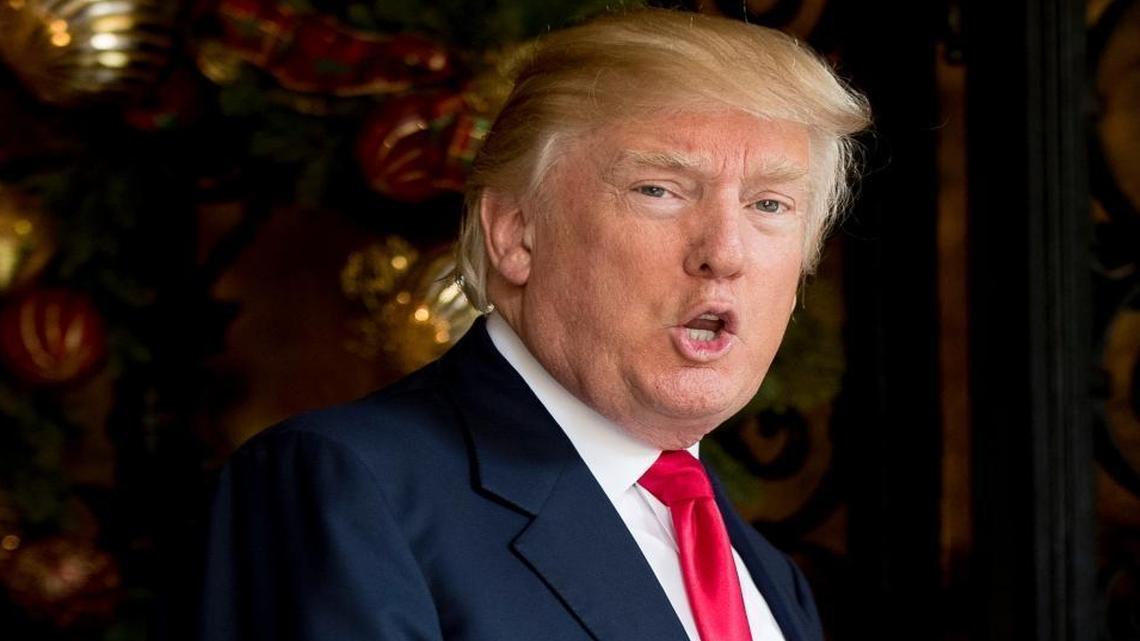 President-elect Donald Trump speaks to members of the media at Mar-a-Lago, in Palm Beach, Fla. Trump named former George W. Bush official Tom Bossert to a top national security post on Tuesday.