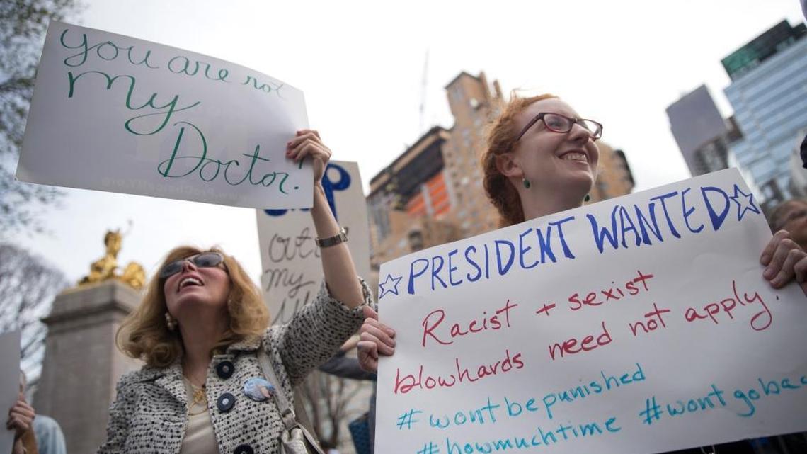 Emily Kadar, right, and Debra Cooper participate in a rally to condemn President-elect Donald Trump’s remar ks about women and abortion on March 31, 2016, in New York.