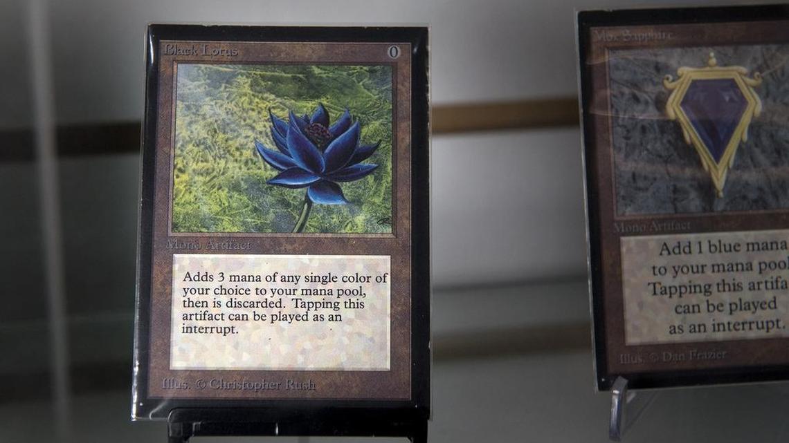 A collector’s edition remake of an original Black Lotus card from Magic: The Gathering is seen at Battleground Games in Modesto on Friday.