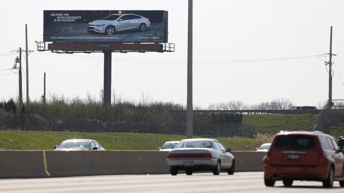 An interactive billboard in Aurora, Ill., touts the Chevy Malibu on April 14, 2016. The sign uses vehicle recognition technology to identify competing sedans and display ads aimed at their drivers.
