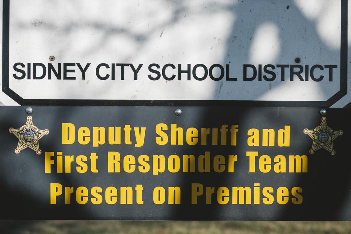 A sign warns would-be intruders of security measures at an elementary school in Sidney, Ohio, Feb. 26, 2018.